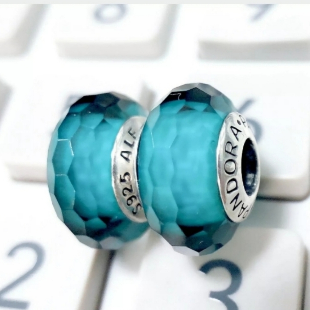 Pandora set of teal Murano glass beads.